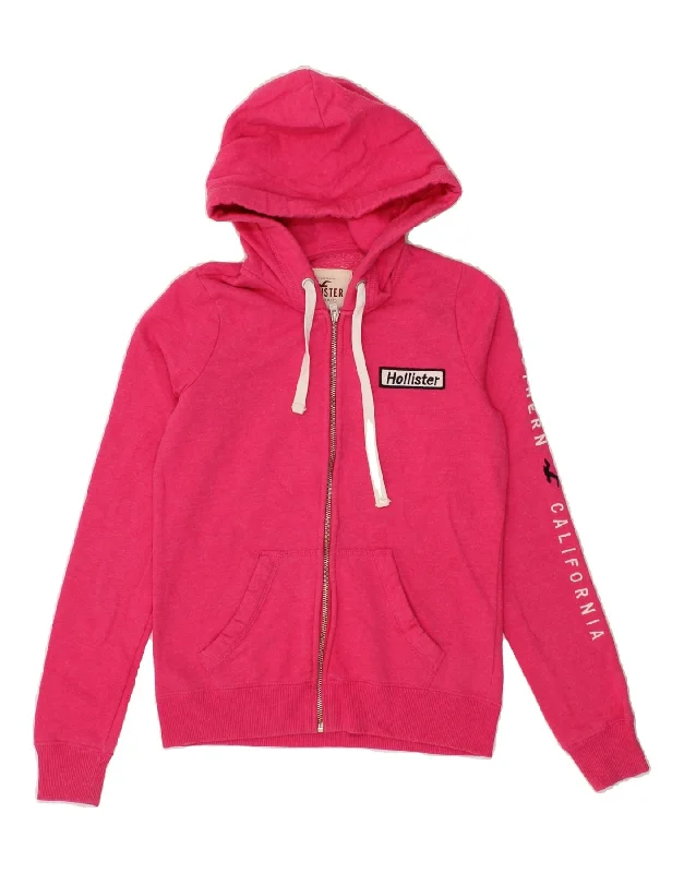HOLLISTER Womens Graphic Zip Hoodie Sweater UK 6 XS Pink Cotton Front Pockets Side Pockets Patch Pockets HOLLISTER Womens Graphic Zip Hoodie Sweater UK 6 XS Pink Cotton Front Pockets Side Pockets Patch Pockets